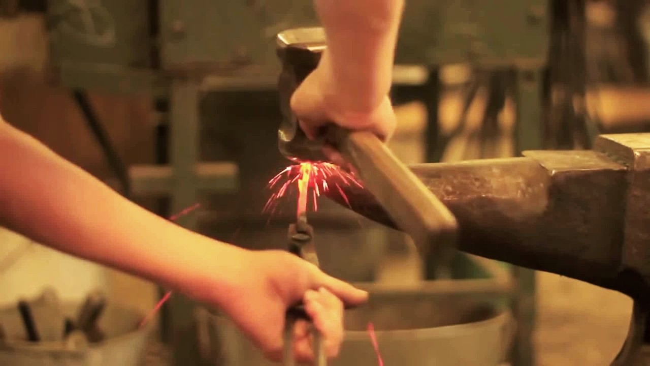 Abridor de garrafas forjado